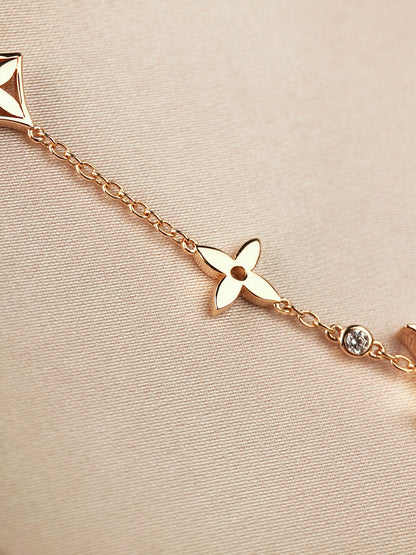 Mysitc STAR AND SUN 7 MOTIFS GOLD BRACELET