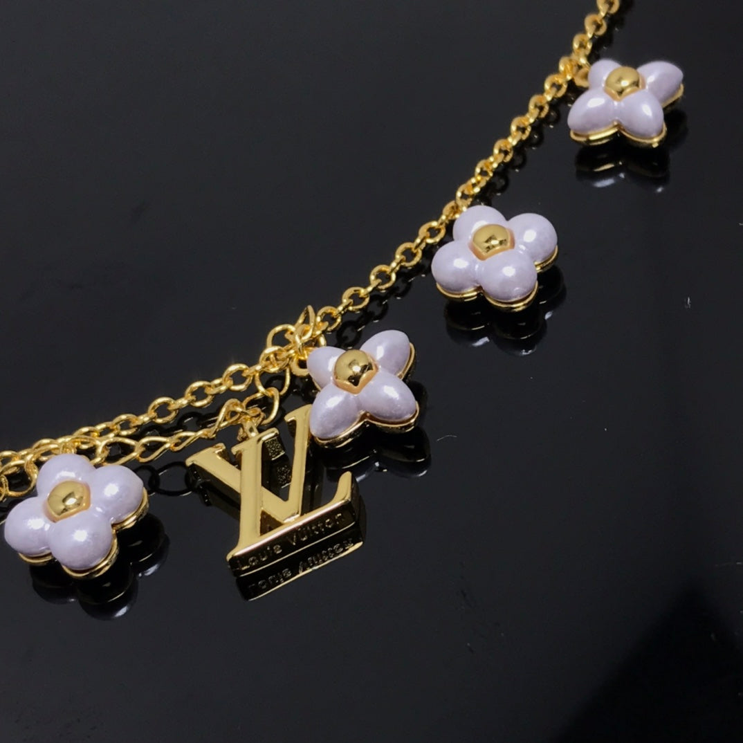 Mysitc LOGO 6 MOTIF STAR AND SUN GOLD BRACELET
